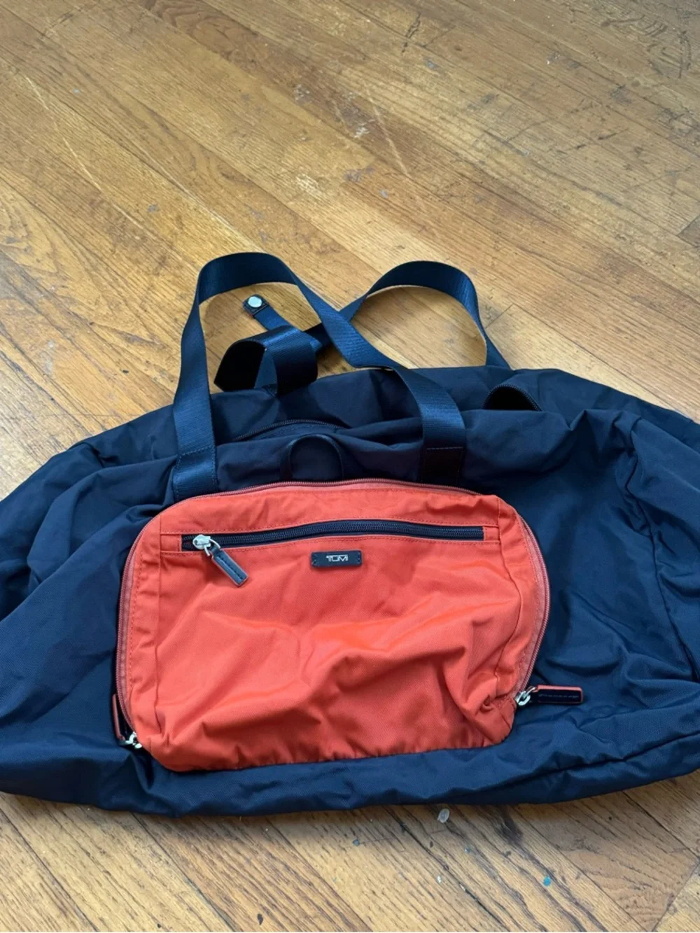 Tumi Duffel Bag with Orange Front Pocket